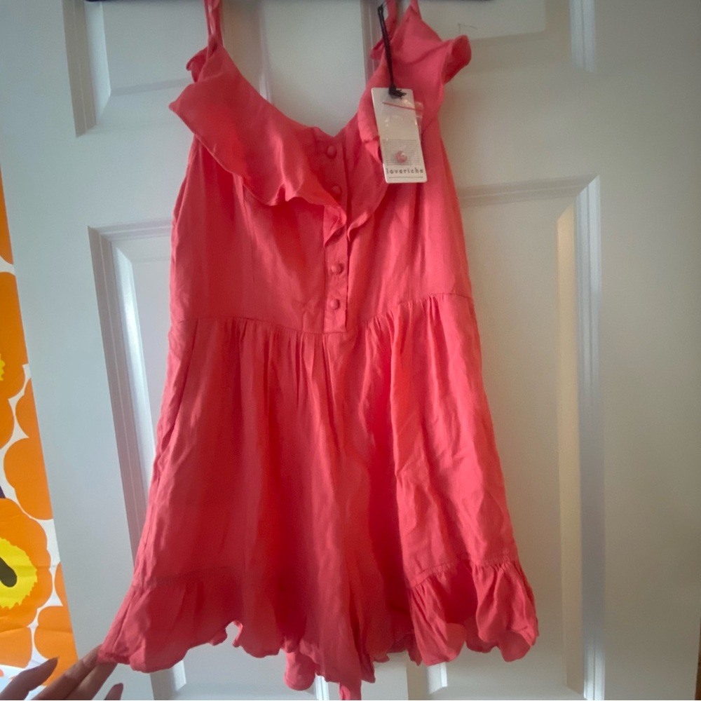 NWT Romper with ruffle details